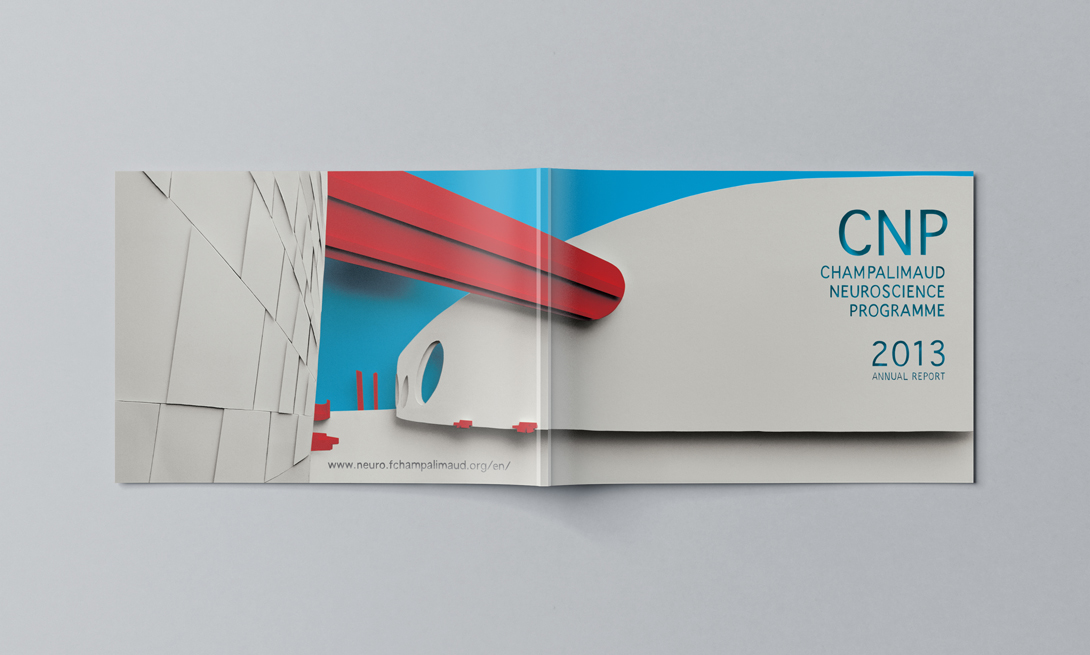 Dupla de páginas do livro de neurociência, evidenciando o layout e a coerência editorial do conteúdo, adjacente aos separadores de recorte de papel.